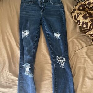 Women's Distressed Blue Jeans